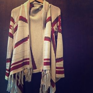 Poncho sweater. Size medium. Only warn once.